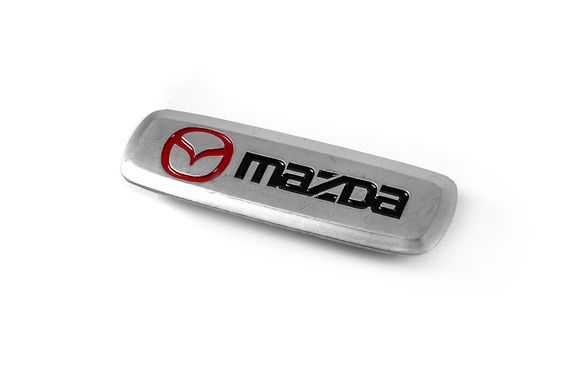 Шильдик алюмінієвий для килимків (1шт) для Тюнінг Mazda