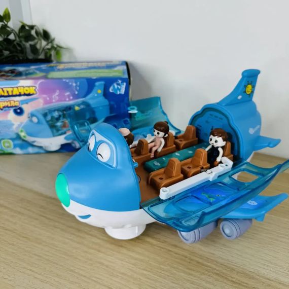 Іграшковий музичний літак з пасажирами, рухається, обертається 360 Airliner Light Music 8811-16 | Зображення 1