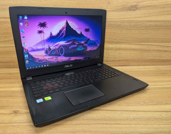 Ігровий ноутбук Asus GL502VML / 15.6" (1920x1080) IPS / Intel Core i5-6300HQ (4 ядра по 2.3 - 3.2 GHz) / 16 GB DDR4 / 256 GB SSD + 1000 GB HDD / nVidia GeForce GTX 1060, 3 GB GDDR5, 192-bit / WebCam / Windows 10 б/в + Подарунок Бездротова миша / USB | Зображення 3