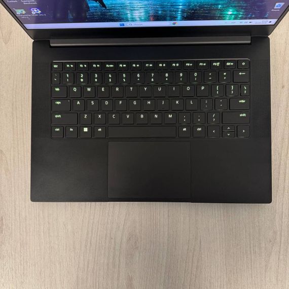 Ігровий ультрабук Razer Blade 14 RZ09-0427 / 14" (2560x1440) IPS / AMD Ryzen 9 6900HX (8 (16) ядер по 3.3 - 4.9 GHz) / 16 GB DDR5 / 512 GB SSD NVMe / nVidia GeForce RTX 3070 Ti, 8 GB GDDR6, 256-bit / WebCam б/в | Зображення 2
