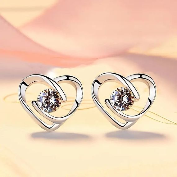 Женские серьги гвоздики Сердечки с белым кристаллом 1.0 см серебристые