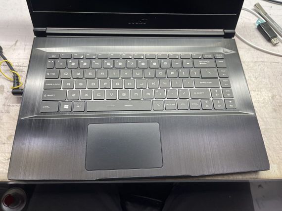 Игровой ноутбук Б-класс MSI GF63 Thin 9SCXR-005 / 15.6" (1920x1080) IPS / Intel Core i5-9300H (4 (8) ядра по 2.4 - 4.1 GHz) / 16 GB DDR4 / 480 GB SSD / nVidia GeForce GTX 1650 Max-Q, 4 GB GDDR6, 128-bit / WebCam б/у | Зображення 5