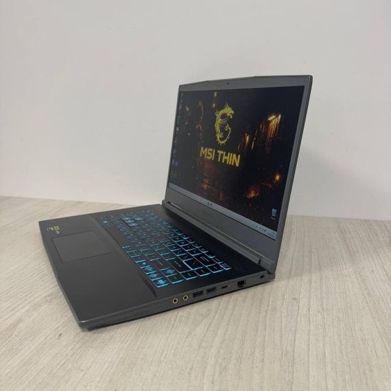 Игровой ноутбук Б-класс MSI Thin A15 B7UC / 15.6" (1920x1080) IPS / AMD Ryzen 5 7535HS (6 (12) ядер по 3.3 - 4.55 GHz) / 16 GB DDR5 / 512 GB SSD / nVidia GeForce RTX 3050, 4 GB GDDR6, 128-bit / WebCam б/у | Зображення 5