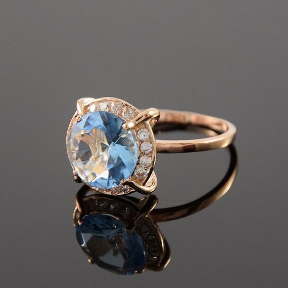 Кольцо из красного золота с большим топазом 16.5