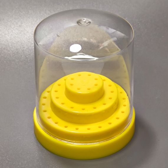 Желтая подставка-подиум для фрез (на 48шт) с прозрачной крышкой
