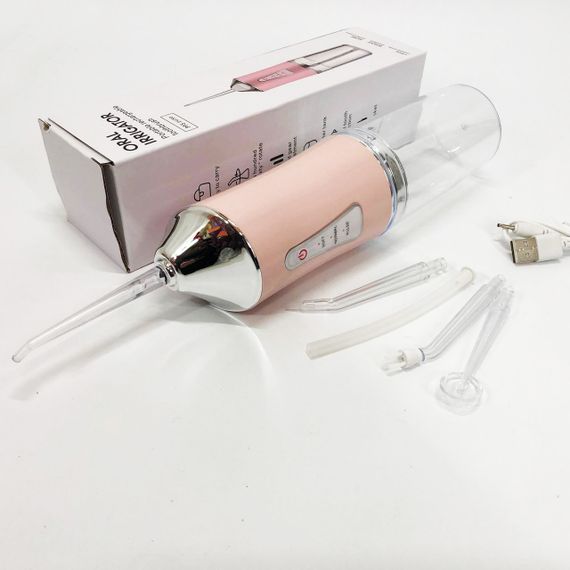 Ирригатор для чистки зубов и полости рта Oral Irrigator с аккумулятором и сменными насадками. Цвет: розовый | Зображення 9