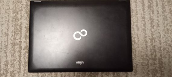 Ноутбук Б-класс Fujitsu LifeBook S760 / 13" (1366x768) TN / Intel Core i5-560M (2 (4) ядра по 2.66 - 3.2 GHz) / 6 GB DDR3 / 120 GB SSD / Intel HD Graphics / WebCam / DVD-ROM б/у | Зображення 2