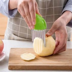 Слайсер із нержавіючої сталі для продуктів.