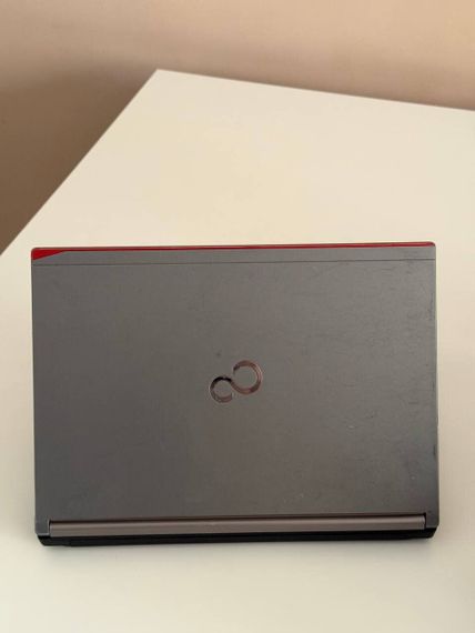 Ноутбук Б-класс Fujitsu LifeBook E734 / 13.3" (1920x1080) TN / Intel Core i5-4210M (2 (4) ядра по 2.6 - 3.2 GHz) / 8 GB DDR3 / 128 GB SSD / Intel HD Graphics 4600 / WebCam / Windows 10 б/у | Зображення 7