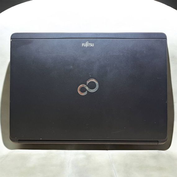 Ноутбук Б-класс Fujitsu LifeBook S792 / 13.3" (1366x768) TN / Intel Core i5-3340M (2 (4) ядра по 2.7 - 3.4 GHz) / 4 GB DDR3 / 320 GB HDD / Intel HD Graphics 4000 б/у | Зображення 1