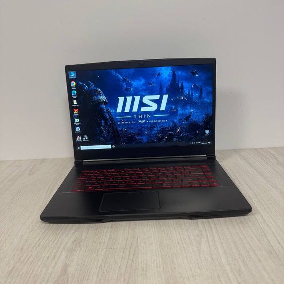 Игровой ноутбук MSI GF65 Thin 9SEXR / 15.6" (1920x1080) IPS / Intel Core i7-9750H (6 (12) ядра по 2.6 - 4.5 GHz) / 16 GB DDR4 / 512 GB SSD M.2 / nVidia GeForce RTX 2060, 6 GB GDDR6, 192-bit / WebCam б/у | Зображення 1