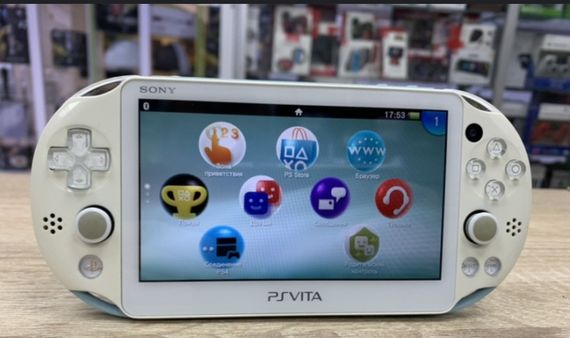 Sony PlayStation Vita 32GB білий б/в з чохлом та зарядкою прошита