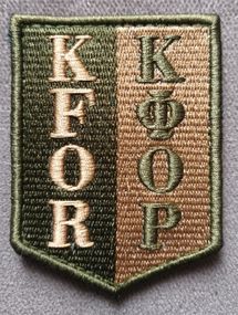 Шеврон КФОР KFOR Украинские Миротворцы (зеленый)