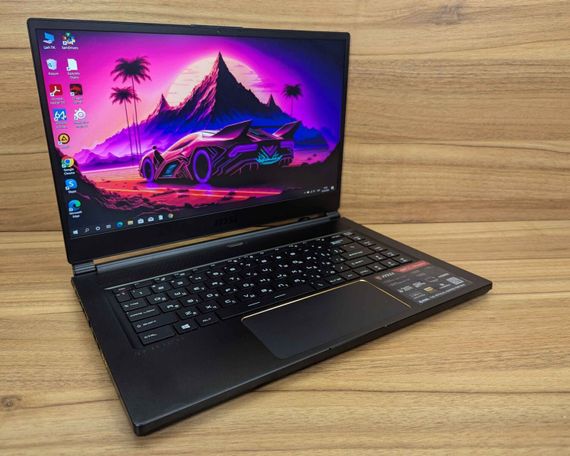 Ігровий ноутбук Б-клас MSI GS65 Stealth 9SE / 15.6" (1920x1080) IPS / Intel Core i7-9750H (6 (12) ядер по 2.6 - 4.5 GHz) / 16 GB DDR4 / 512 GB SSD / nVidia GeForce RTX 2060, 6 GB GDDR6, 192-bit / WebCam / Windows 10 б/в + Подарунок Бездротова миша | Зображення 3