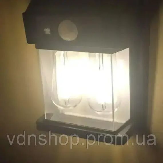 Настінний вуличний світильник із сонячною панеллю, ліхтар із датчиком на рух SOLAR WALL LAMP YX-777 Black | Зображення 2