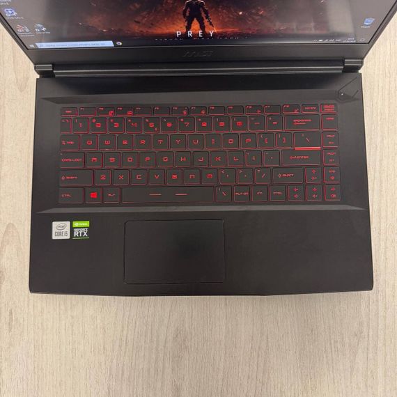 Ігровий ноутбук MSI GF63 Thin 10UC / 15.6" (1920x1080) IPS / Intel Core i5-10500H (6 (12) ядра по 2.5 - 4.5 GHz) / 16 GB DDR4 / 512 GB SSD / nVidia GeForce RTX 3050, 4 GB GDDR6, 128-bit / WebCam б/в | Зображення 2