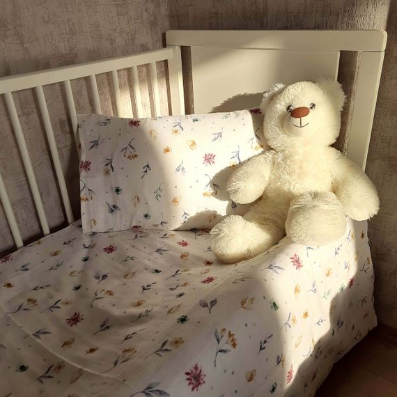 Комплект постільної білизни в ліжечко SoundSleep Flowers муслін дитячий 112х147 см (94101843) | Зображення 1