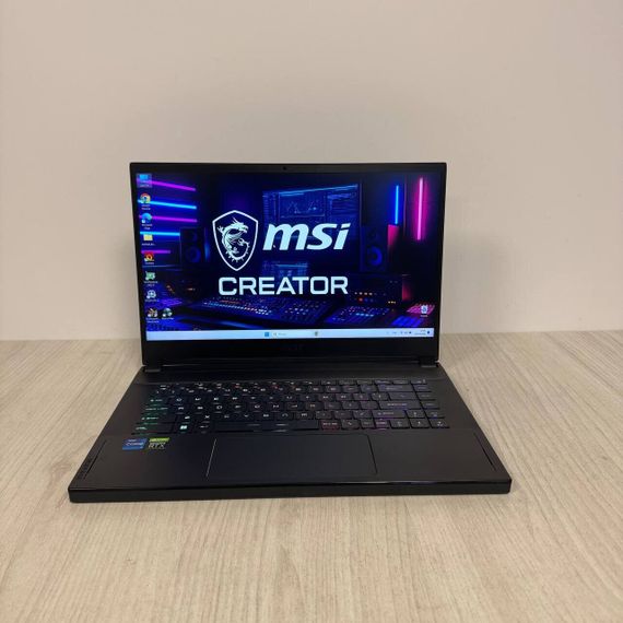 Ігровий ноутбук MSI Creator 15 A11UH / 15,6" (1920x1080) IPS / Intel Core i7-11800H (8 (16) ядер по 1,9 - 4,6 ГГц) / 16 ГБ DDR4 / 512 ГБ SSD / nVidia GeForce RTX 3080, 8 ГБ GDDR6, 256-біт / Веб-камера б/в | Зображення 1