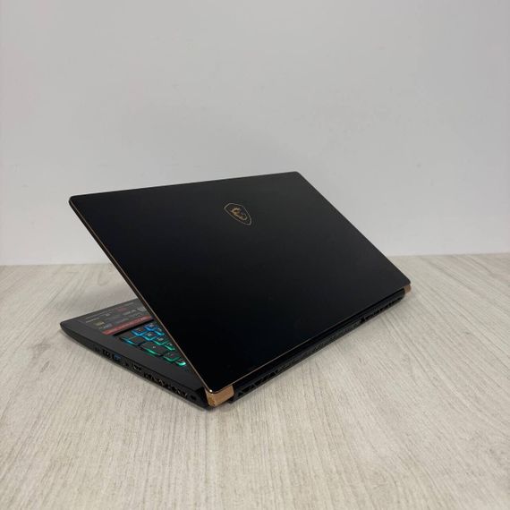Игровой ноутбук Б-класс MSI GS75 Stealth 9SF / 17.3" (1920x1080) IPS / Intel Core i7-10875H (8 (16) ядер по 2.3 - 5.1 GHz) / 16 GB DDR4 / 512 GB SSD / nVidia GeForce RTX 2060, 6 GB GDDR6, 192-bit / WebCam б/у | Зображення 4