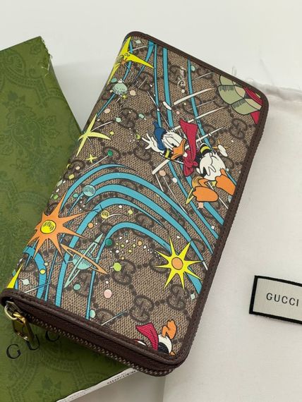 Вертикальний гаманець Gucci Aria з принтом Disney