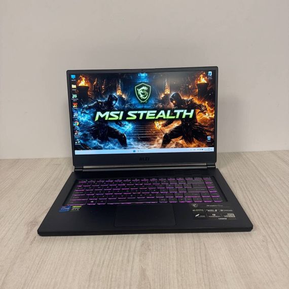Игровой ноутбук Б-класс MSI Stealth 15M A11UEKV / 15.6" (1920x1080) IPS / Intel Core i7-11375H (4 (8) ядра по 3.0 - 5.0 GHz) / 16 GB DDR4 / 512 GB SSD NVMe / nVidia GeForce RTX 3060, 6 GB GDDR6, 192-bit / WebCam б/у | Зображення 1