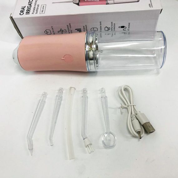 Ирригатор для чистки зубов и полости рта Oral Irrigator с аккумулятором и сменными насадками. Цвет: розовый | Зображення 7