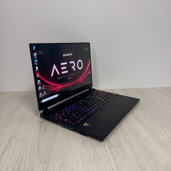 Ігровий ультрабук Б-клас Gigabyte Aero 15 OLED YC / 15.6" (3840x2160) OLED / Intel Core i7-10850H (6 (12) ядер по 2.7 - 5.1 GHz) / 16 GB DDR4 / 512 GB SSD / nVidia GeForce RTX 3080, 8 GB GDDR6, 256-bit / WebCam б/в | Зображення 4