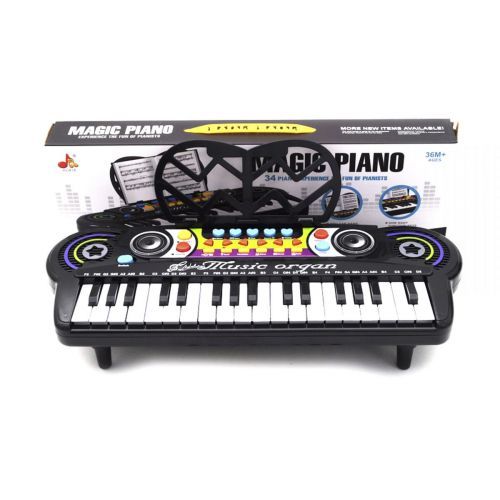 Уценка. Пианино с подставкой для нот "Magic Piano", 34 клавиши - заедает две клавиши