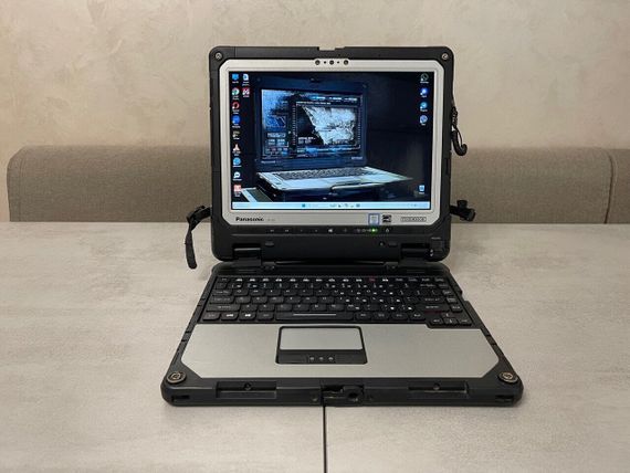 Захищений  нетбук-трансформер Б-клас Panasonic Toughbook CF-33 / 12.5" (2160x1440) IPS Touch / Intel Core i7-7600U (2 (4) ядра по 2.8 - 3.9 GHz) / 16 GB DDR3 / 256 GB SSD / Intel HD Graphics 620 / WebCam / GPS / Два АКБ б/в + Подарунок Дротова миша / USB | Зображення 1