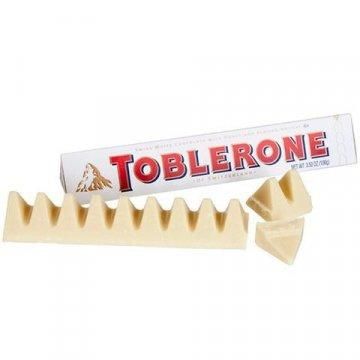Швейцарський білий шоколад Toblerone з родзинками, нугою з меду і мигдальним горіхом, 100 г | Зображення 1