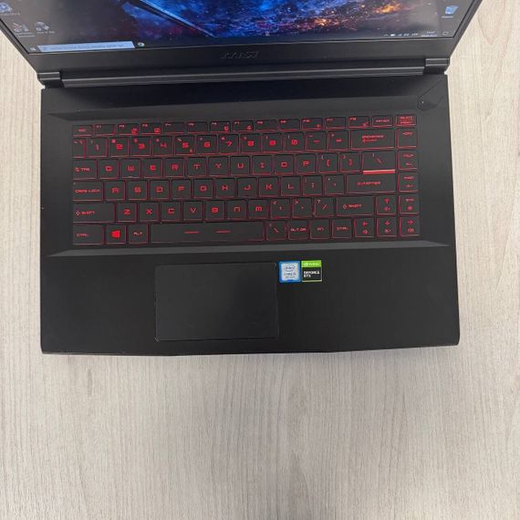 Игровой ноутбук MSI GF63 Thin 9SCXR / 15.6" (1920x1080) IPS / Intel Core i5-9300H (4 (8) ядра по 2.4 - 4.1 GHz) / 16 GB DDR4 / 512 GB SSD / nVidia GeForce GTX 1650 Max-Q, 4 GB GDDR6, 128-bit / WebCam б/у | Зображення 2