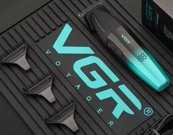 Машинка для стрижки VGR V-003 роторная аккумуляторная режим Turbo 6 насадок 0.5-12 мм LED-индикатор 5 Вт Черный с бирюзовым | Зображення 4