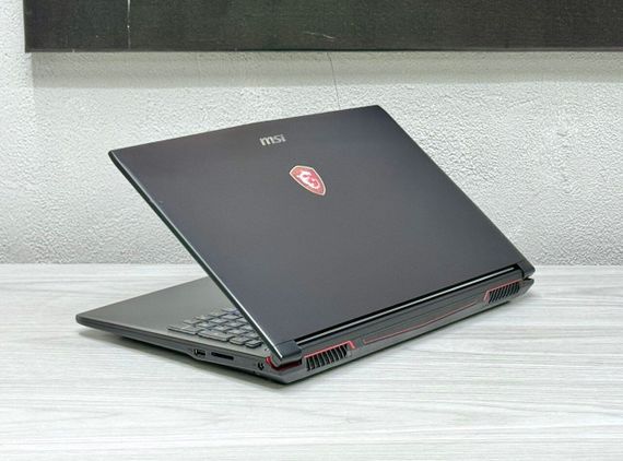 Ігровий ноутбук MSI GP62 / 15.6" (1920x1080) TN / Intel Core i7-7700HQ (4 (8) ядра по 2.8 - 3.8 GHz) / 16 GB DDR4 / 128 GB SSD M.2 + 1000 GB HDD / nVidia GeForce GTX 1060, 3 GB GDDR5, 192-bit / WebCam / Win 11 б/в | Зображення 5