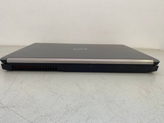 Мобільна робоча станція Fujitsu Celsius H730 / 15.6" (1920x1080) IPS / Intel Core i7-4810MQ (4 (8) ядра по 2.8 - 3.8 GHz) / 16 GB DDR3 / 256 GB SSD / nVidia Quadro K1100M, 2 GB GDDR5, 128-bit / WebCam / DVD-ROM б/в | Зображення 4