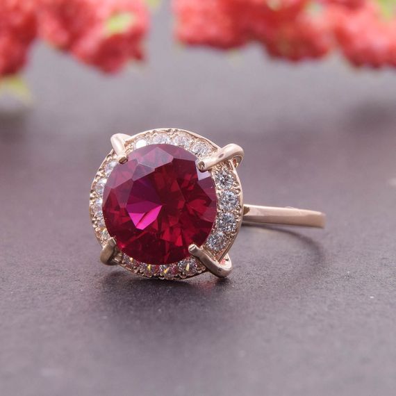 Кольцо из желтого золота с большим розовым камнем 14.5 | Зображення 1