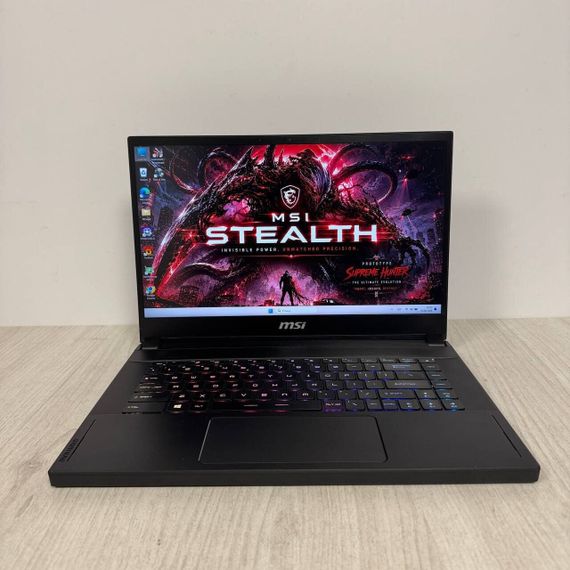 Игровой ноутбук Б-класс MSI GS66 Stealth 11UH / 15.6" (1920x1080) IPS / Intel Core i9-11900H (8 (16) ядер по 2.5 - 4.9 GHz) / 16 GB DDR4 / 512 GB SSD / nVidia GeForce RTX 3080, 16 GB GDDR6, 256-bit / WebCam б/у | Зображення 1