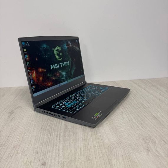 Ігровий ноутбук Б-клас MSI Thin A15 B7VE / 15.6" (1920x1080) IPS / AMD Ryzen 7 7735HS (8 (16) ядер по 3.2 - 4.75 GHz) / 16 GB DDR5 / 512 GB SSD NVMe / nVidia GeForce RTX 4050, 6 GB GDDR6, 96-bit / WebCam б/в | Зображення 4