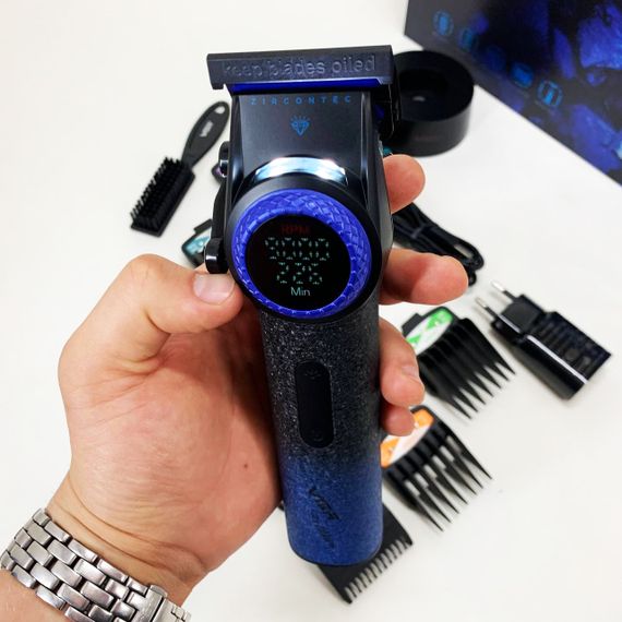 Професійна машинка для стрижки волосся VGR V-001 BLUE з дисплеєм 9000 об/хв та 10 насадками 1,5-24 мм | Зображення 7