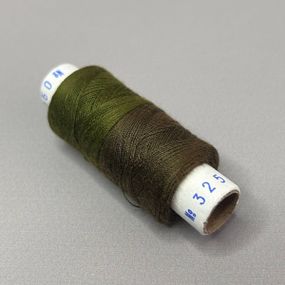325/090 Нитки в котушках 40/2 , половинки (котушка 2х75м)