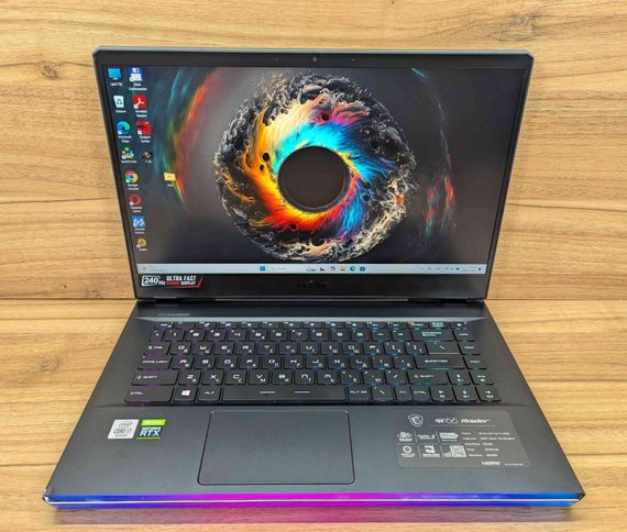 Ігровий ноутбук Б-клас MSI GE66 Raider 10SFS / 15.6" (1920x1080) IPS / Intel Core i7-10750H (6 (12) ядер по 2.6 - 5.0 GHz) / 32 GB DDR4 / 1000 GB SSD / nVidia GeForce RTX 2070 Super, 8 GB GDDR6, 256-bit / WebCam / Windows 11 б/в +Подарунок Миша / USB | Зображення 1