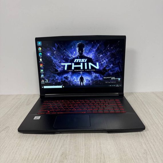 Ігровий ноутбук Б-клас MSI GF65 Thin 10UE / 15.6" (1920x1080) IPS / Intel Core i5-10200H (6 (12) ядер по 2.5 - 4.5 GHz) / 16 GB DDR4 / 512 GB SSD / nVidia GeForce RTX 3060, 6 GB GDDR6, 192-bit / WebCam б/в | Зображення 1