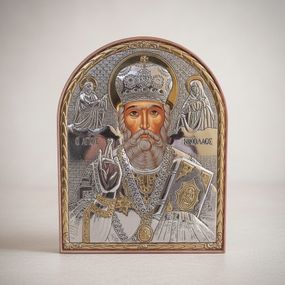 Срібна православна ікона Миколай Чудотворець з позолотою на підставці