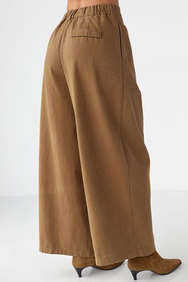 Котонові штани-палаццо зі складками - світло-коричневий цвет, S (є розміри) | Зображення 1