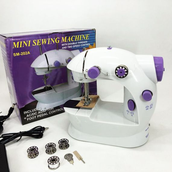 Мини швейная машинка FHSM 202 4 в 1 с педалью и подсветкой + адаптер 220V, Швейная машина для детей | Зображення 1