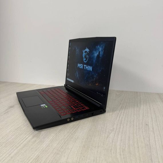 Игровой ноутбук MSI GF63 Thin 9SCXR / 15.6" (1920x1080) IPS / Intel Core i5-9300H (4 (8) ядра по 2.4 - 4.1 GHz) / 16 GB DDR4 / 512 GB SSD / nVidia GeForce GTX 1650 Max-Q, 4 GB GDDR6, 128-bit / WebCam б/у | Зображення 7
