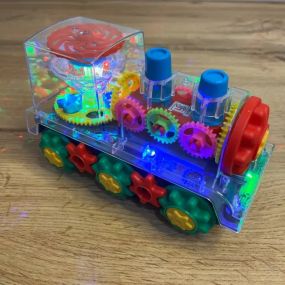 Дитячий інтерактивний прозорий поїзд зі світлом, музикою та поворотом на 360°