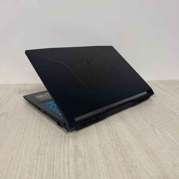 Игровой ноутбук Б-класс MSI Bravo 15 C7VFK / 15.6" (1920x1080) IPS / AMD Ryzen 7 7735HS (8 (16) ядер по 3.2 - 4.75 GHz) / 16 GB DDR5 / 512 GB SSD NVMe / nVidia GeForce RTX 4060, 8 GB GDDR6, 128-bit / WebCam б/у | Зображення 6