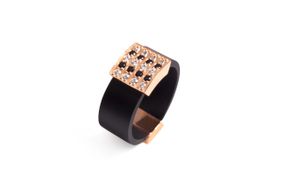 Кольцо из красного золота с каучуком и фианитами K-0432 17.5