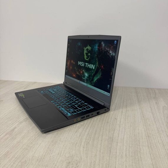 Ігровий ноутбук Б-клас MSI Thin A15 B7VE / 15.6" (1920x1080) IPS / AMD Ryzen 7 7735HS (8 (16) ядер по 3.2 - 4.75 GHz) / 16 GB DDR5 / 512 GB SSD NVMe / nVidia GeForce RTX 4050, 6 GB GDDR6, 96-bit / WebCam б/в | Зображення 5
