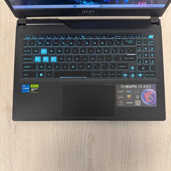 Игровой ноутбук Б-класс MSI Cyborg 15 A12VF / 15.6" (1920x1080) IPS / Intel Core i5-12450H (8 (12) ядер по 3.3 - 4.4 GHz) / 16 GB DDR5 / 512 GB SSD M.2 / nVidia GeForce RTX 4060, 8 GB GDDR6, 128-bit / WebCam б/у | Зображення 2
